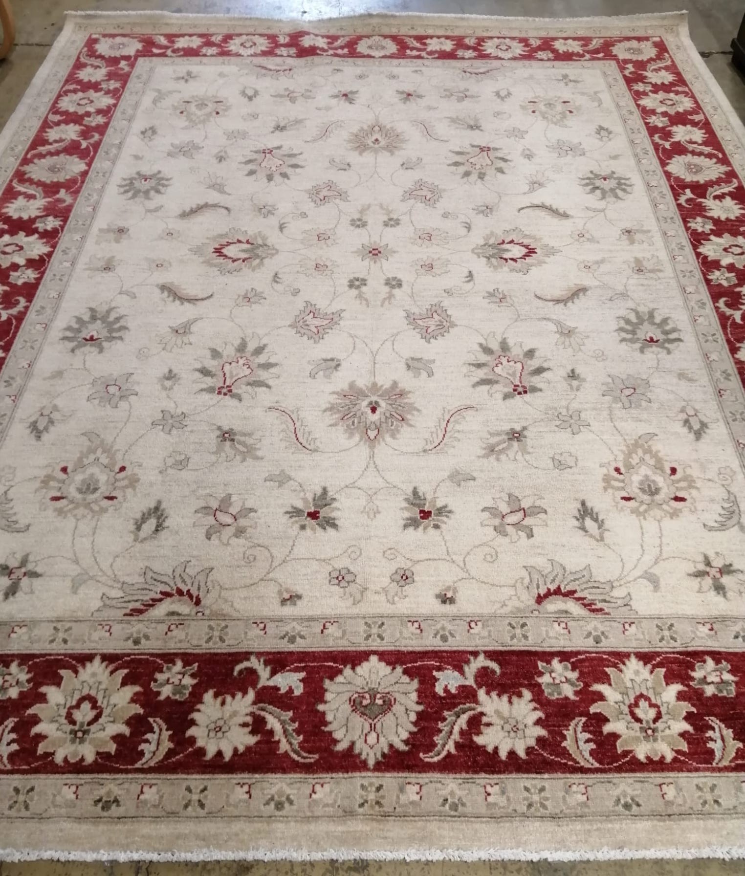 A Zeigler style ivory ground carpet, 305 x 243cm